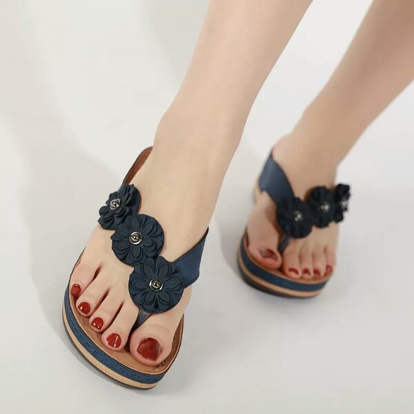 Soft, cozy, black wedge sandal with flowers